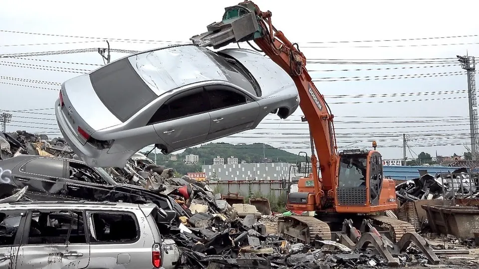 Old car being removed for scrap